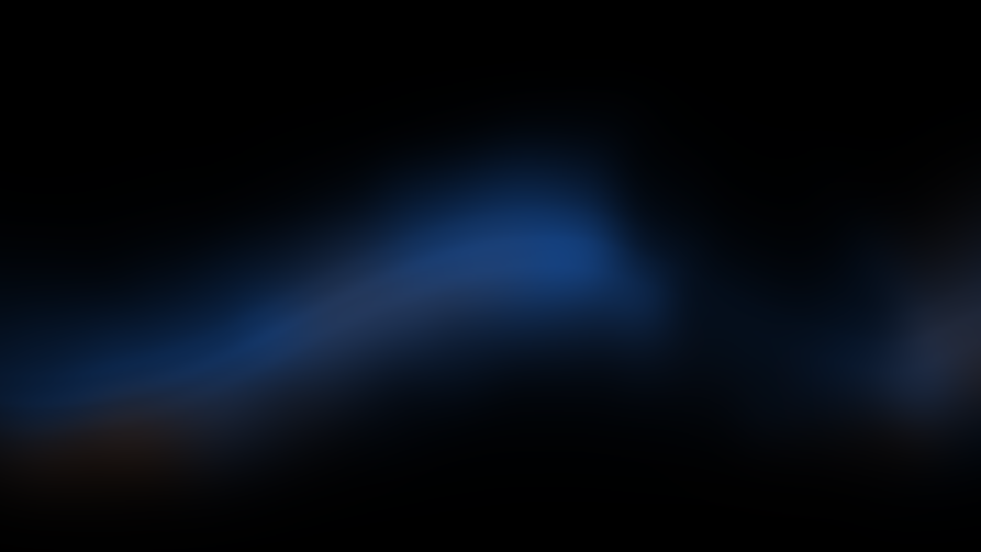Soft blue and copper light flowing across a dark field, inspired by Earth’s horizon.